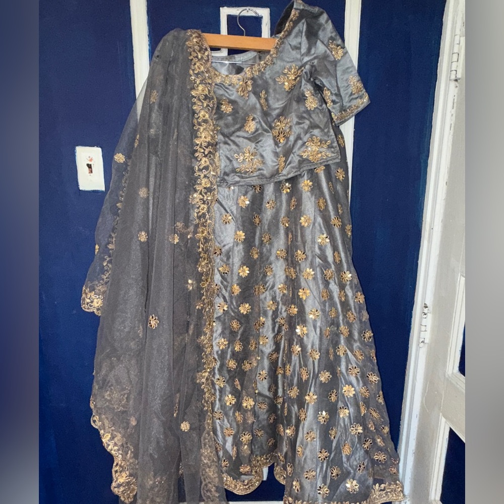 Gray and gold Indian Lengha dress